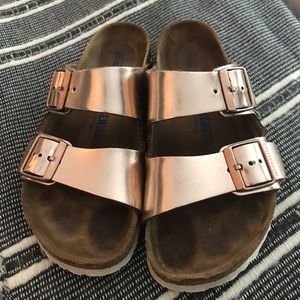 Copper/rose gold women’s Arizona Birkenstocks